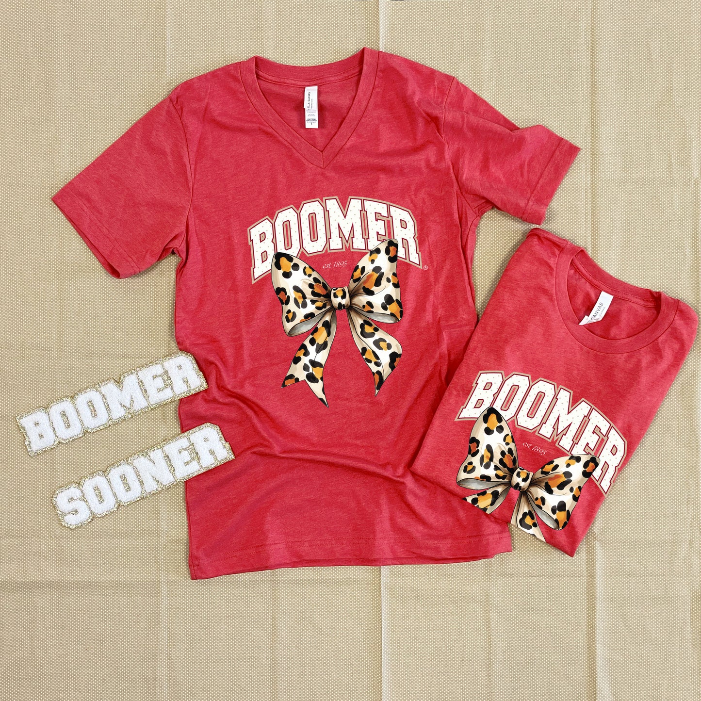 UNIV. OF OK 2025: Boomer Leopard Bow (BELLA CANVAS VNECK)