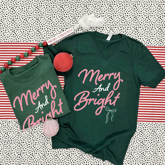 CHRISTMAS 2025: Merry & Bright Pink Script (BELLA CANVAS VNECK OR CREW NECK)