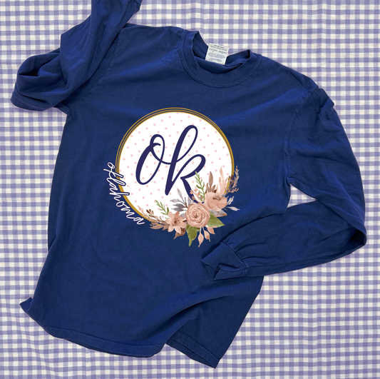 OKLAHOMA 2025: OK Script Floral Wreath With *Gold Shimmer* (COMFORT COLORS LONGSLEEVE)