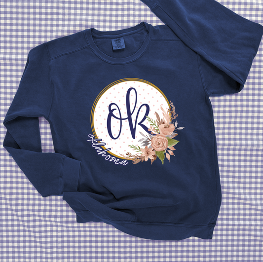 OKLAHOMA 2025: OK Script Floral Wreath With *Gold Shimmer* (COMFORT COLORS SWEATSHIRT)