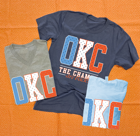 2026 OKC SPIRIT: OKC The Champs Are Back! (VNECK or CREW NECK)