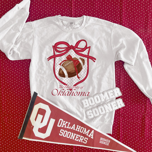 UNIV. OF OK 2025: Polkadot Crest & Football (COMFORT COLORS SWEATSHIRT)